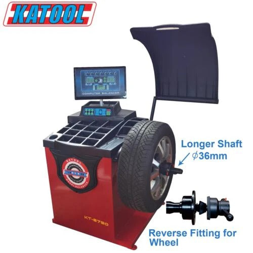 Wheel balancer with red housing, blue display, and dark blue protective cover