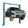 Two-post car lift with a blue frame holding a dark pickup truck