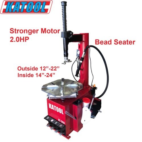 Katool tire changer with red stand, bead seater, and mounted wheel platform