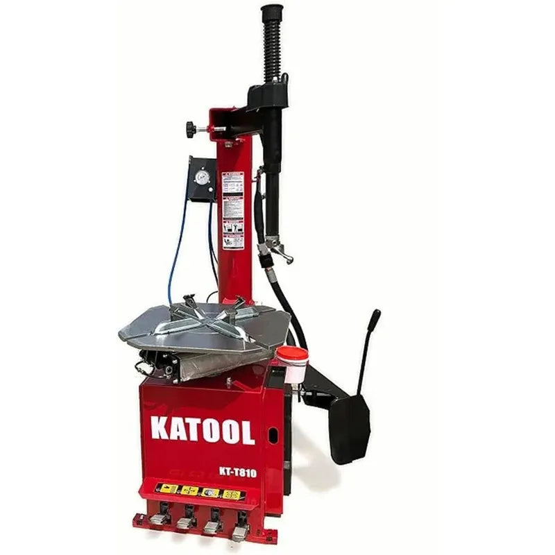 Red tire changer machine with mounting platform, bead tool arm, and black side handle