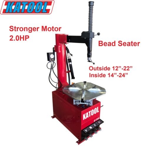 Katool tire changer with bead seater arm and round wheel platform on red body