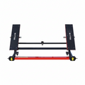 Portable tilting floor car jack with two black lift plates and red base bar