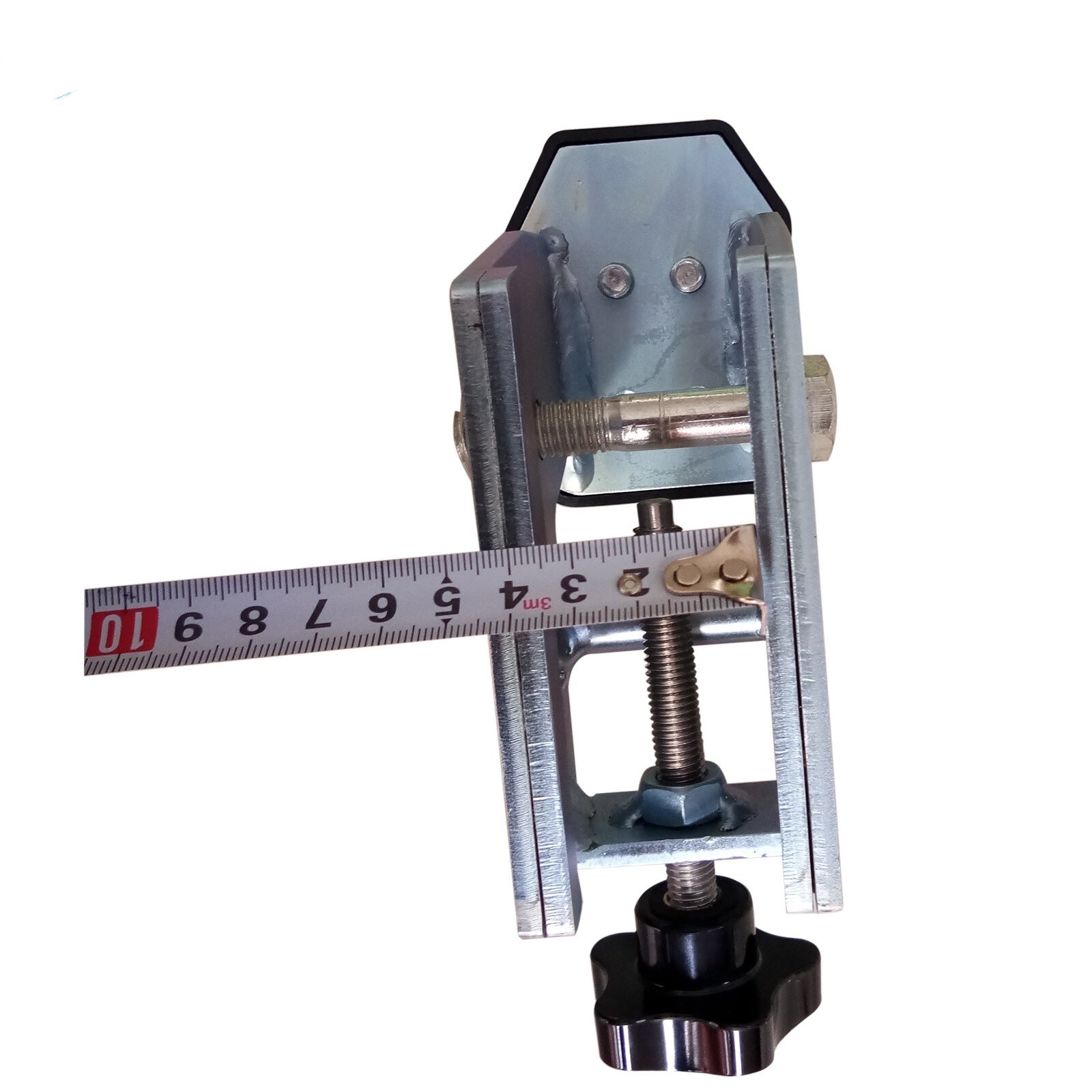 Motorcycle wheel adaptor with metal clamp and ruler for size reference