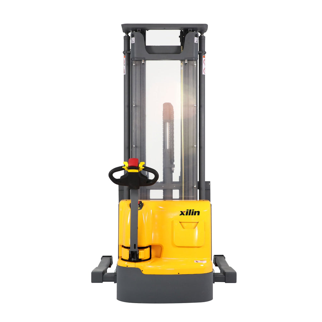 Electric forklift-style stacker front view with wide forks and yellow body, xilin badge.