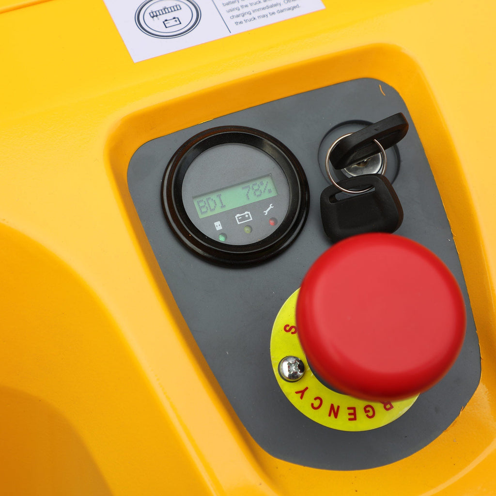 Yellow control panel with digital display and red emergency stop button